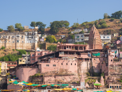 Historic Omkareshwar Temple and riverside town nestled on Mandhata Island along the sacred Narmada River in Madhya Pradesh.