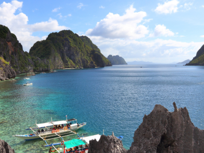 Cruise through the dramatic limestone cliffs and crystal-clear lagoons of El Nido, Palawan, one of the Philippines' most breathtaking island destinations.