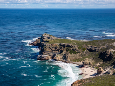 Dramatic cliffs and turquoise ocean at Cape Point in South Africa.